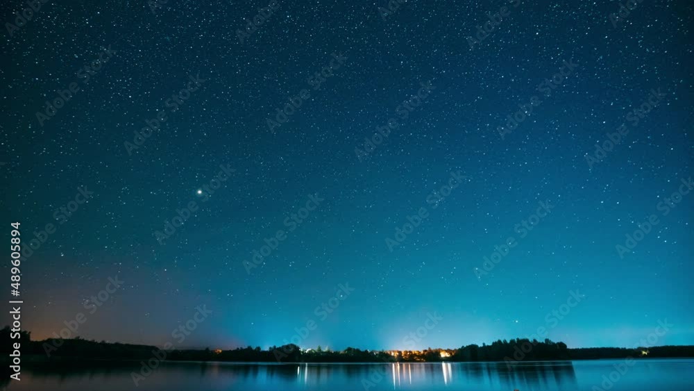 Lyepyel District, Vitebsk Province, Belarus. Real Colorful Night Stars Above Lepel Lake. Natural Starry Sky Background Backdrop Landscape. Time lapse. 4K. Lyepyel District, Vitebsk Province, Belarus. Real Colorful Night Stars Above Lepel Lake. Natural Starry Sky Background Backdrop Landscape. Time lapse. 4K.