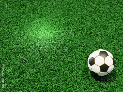 Football field White soccer ball. Normal pattern with red and white, Green grass background. 3D rendering © Montrakrit