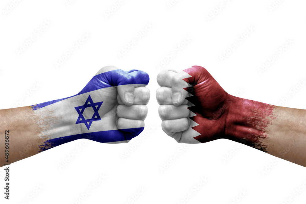 Two hands punch to each others on white background. Country flags painted fists, conflict crisis concept between israel and qatar Two hands punch to each others on white background. Country flags painted fists, conflict crisis concept between israel and qatar