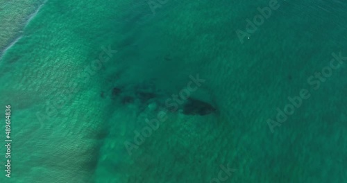 The  shipwreck of the Dellie or Apple Wreck as it is called just behind the breakers on Fingal Beach near Tweed Heads. Wrecked in 1941. Appears and disappears with the currents. Drone view from above