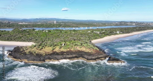 Fingal Headland with the Tweed River behind and Mt Warning on the horizon. Also looking north towards Tweed Heads and the Gold Coast high-rise