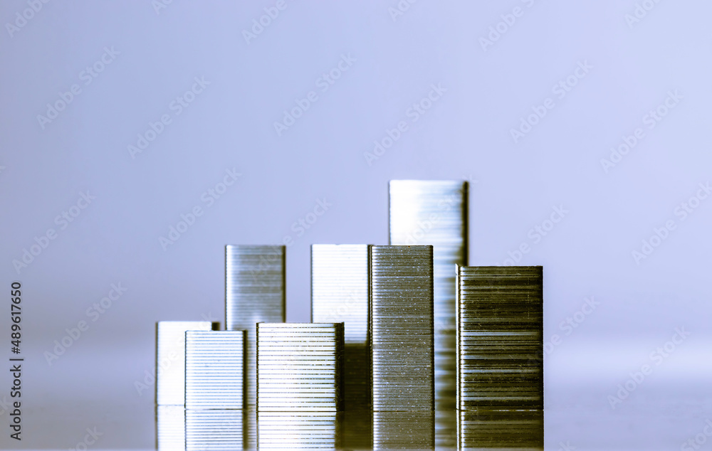 City sky scrapers, imitation made of staples with the blue background City sky scrapers, imitation made of staples with the blue background