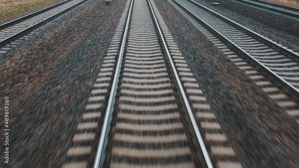 Train Passing By Railway Station Platform with Track Concrete Railroad Ties and Crushed Stone Ballast Seen from Train Driver Seat POV Train Passing By Railway Station Platform with Track Concrete Railroad Ties and Crushed Stone Ballast Seen from Train Driver Seat POV