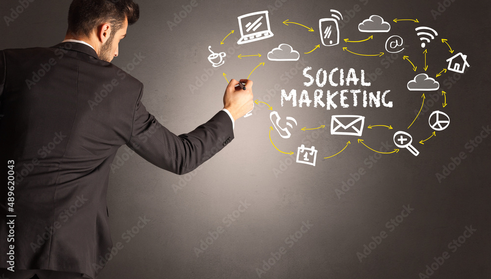 businessman drawing social media icons businessman drawing social media icons