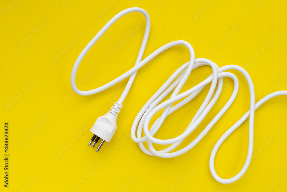 Electrical plug on yellow background. Electrical plug on yellow background.