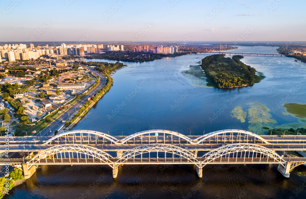 Aerial view of the Darnytsia arch bridges across the Dnieper in Kiev, Ukraine