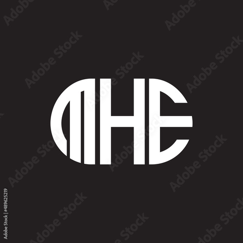 MHE letter logo design on black background. MHE creative initials letter logo concept. MHE letter design. photo