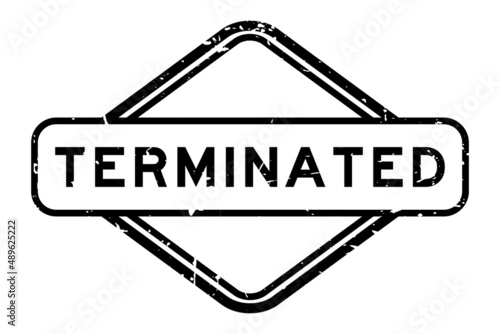 Grunge black terminated word rubber seal stamp on white background
