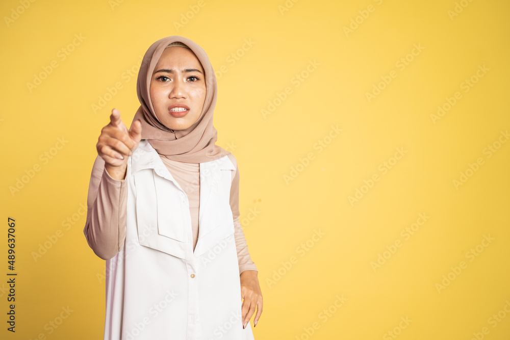woman with finger pointing make fun on someone woman with finger pointing make fun on someone