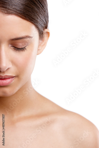 Her skin is so pure. Cropped studio shot of a beautiful young woman with her eyes closed.