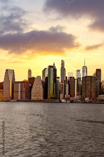 Beautiful sunset clouds over Manhattan skyline in New York City shot across the river Hudson in New York City 