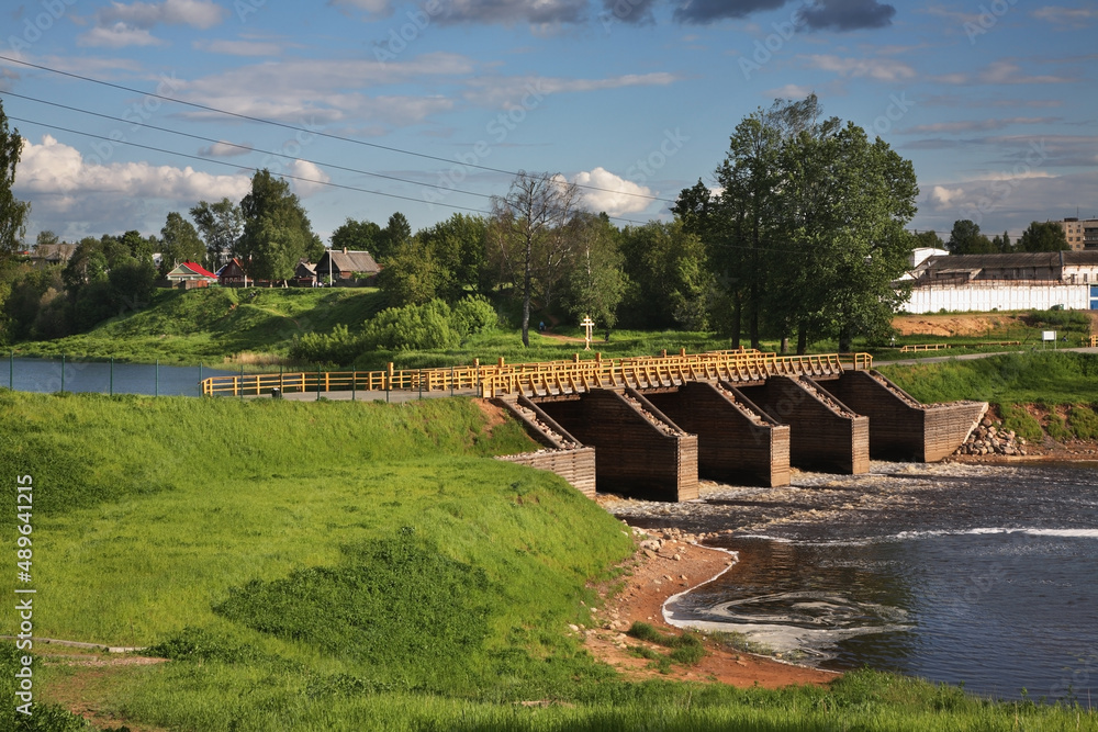 Fototapeta premium Dam of Tikhvinsky lock at Tikhvinka river in Tikhvin. Leningrad oblast. Russia