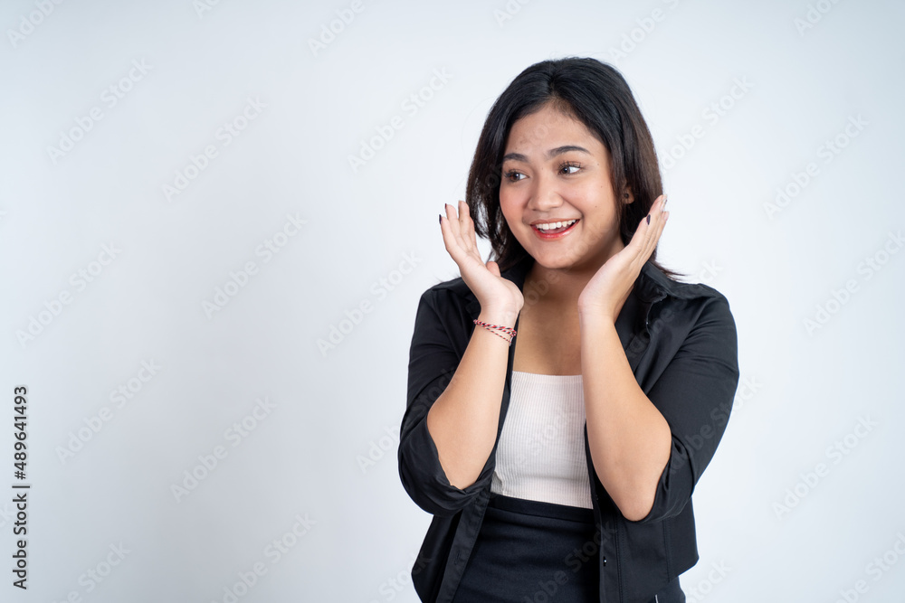 Excited young asian woman opening two palms while smiling Excited young asian woman opening two palms while smiling