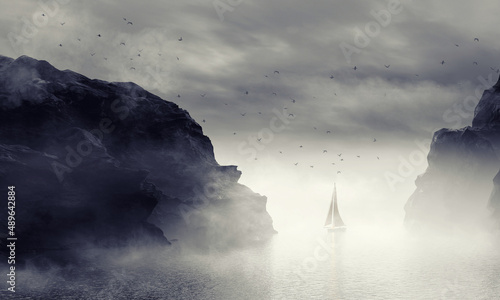 Wallpaper Mural Sailing yacht in the fog among the black rocks. atmospheric seascape Torontodigital.ca