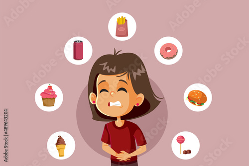 Little Girl Having a Stomachache after Eating Fast Food and Sweets