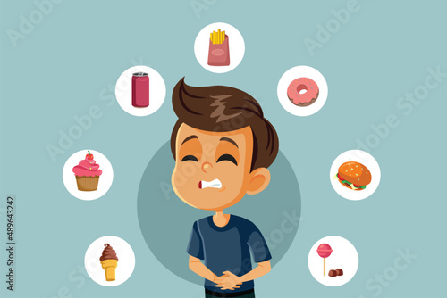 Little Boy Having a Stomachache after Eating Fast Food and Sweets