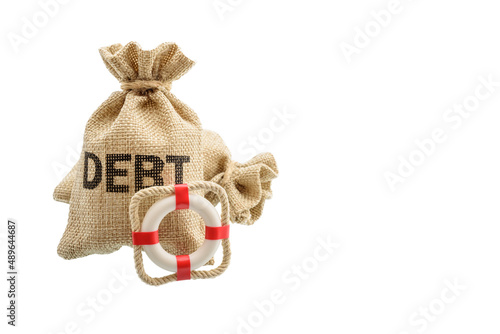 Credit disability / debt protection and insurance concept : Debt bags, red lifebuoy isolated on white, depicts a voluntary loan payment protection that help relief from financial burden of delinquency photo