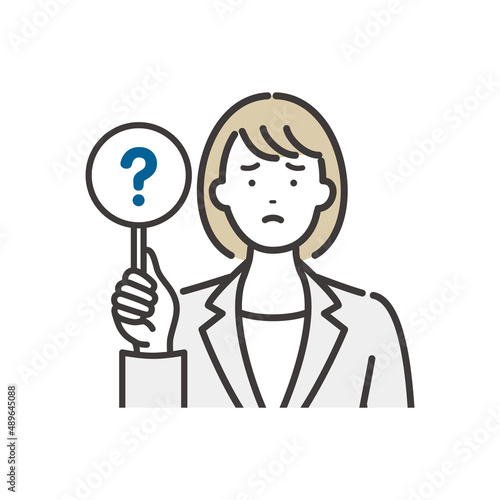 回答札（？）を持つビジネスウーマン