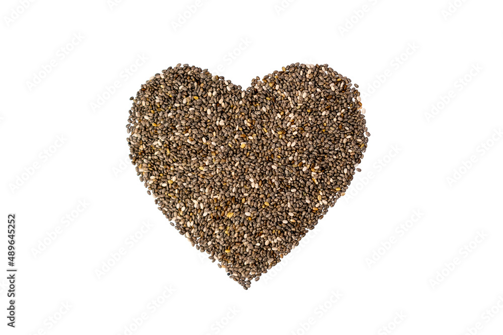 Pile of black chia seeds in heart shape isolated on white background. Superfood for healthy nutrition and diet, contains vitamins and minerals. Top view.