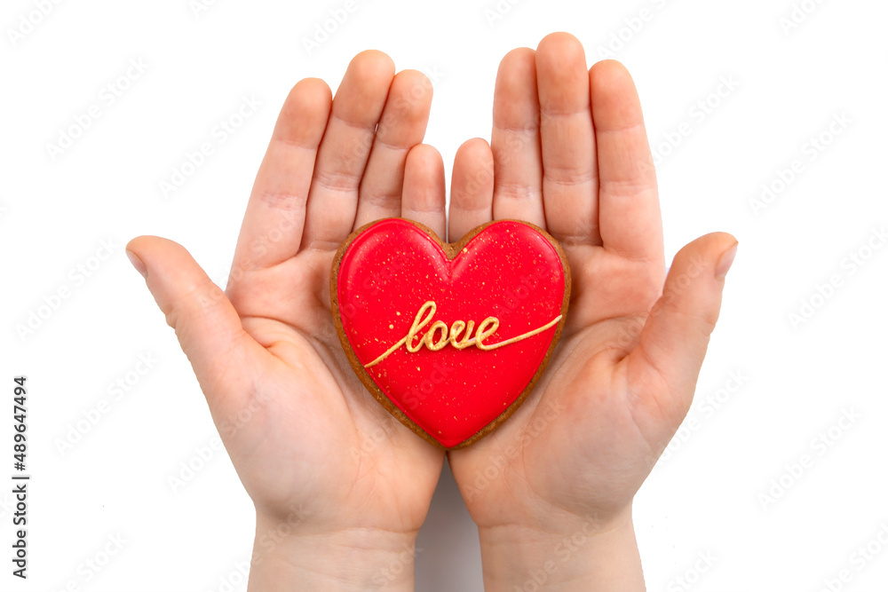 Cookies in the form of a red heart with the inscription Cookies in the form of a red heart with the inscription