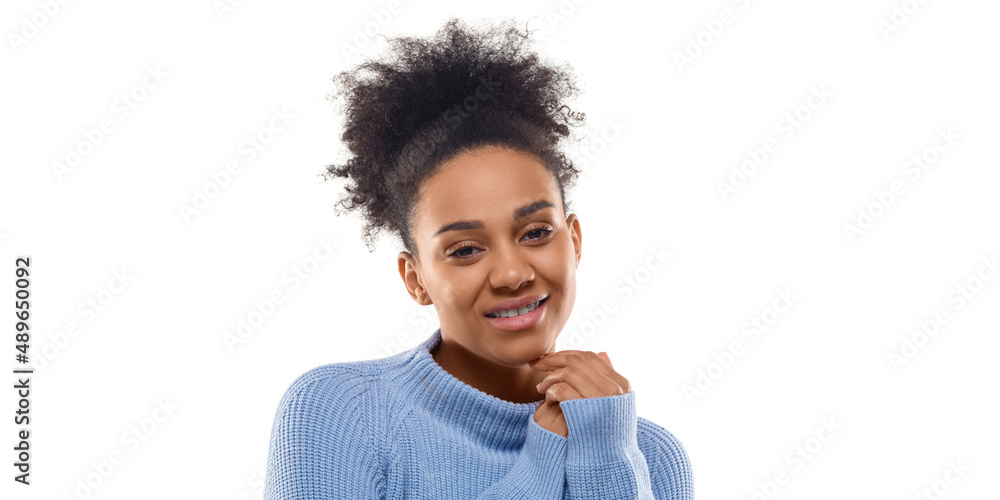 Isolated portrait of a 30 years old smiling African-American woman looking at camera - psychology and feminine health concept. Isolated portrait of a 30 years old smiling African-American woman looking at camera - psychology and feminine health concept.