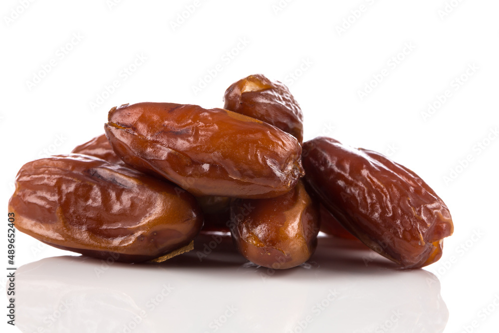 Date fruit close up isolated on white background Date fruit close up isolated on white background