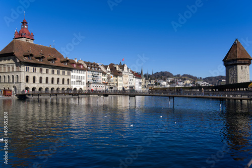Cityscape of medieval old town of Luzern with river Reuss on a sunny winter day. Photo taken February 9th, 2022, Lucerne, Switzerland. © Michael Derrer Fuchs