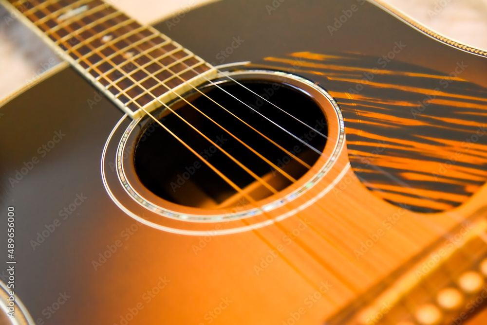 Naklejka premium アコースティックギターのアップ 