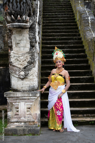 Portrait Balinese women wearing traditional posing on the steps to the temple  © Ace Mason