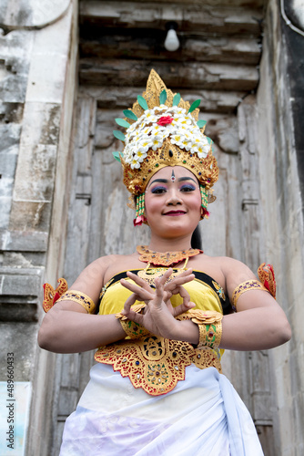 Portrait of beautiful young balinese woman wearing traditional costume