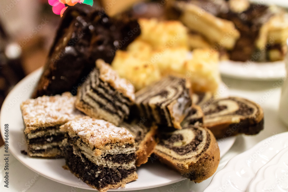 Delicious slices of layer cake and Swiss roll Delicious slices of layer cake and Swiss roll