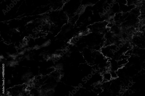 Black marble texture with natural pattern for background or design artwork.