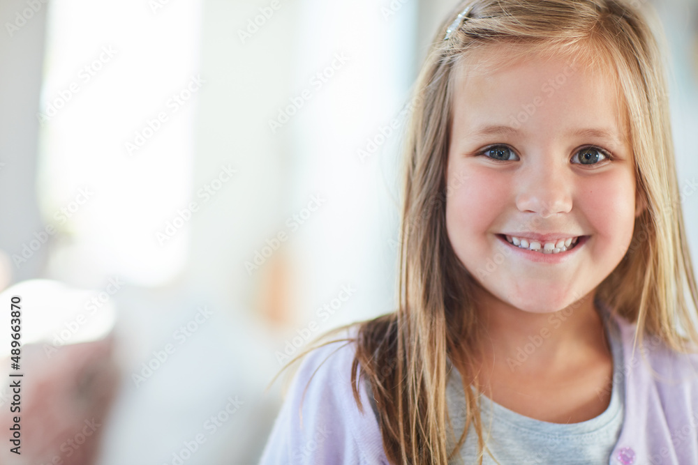 Shes the happiest girl in the world. Portrait of an adorable little girl at home. Shes the happiest girl in the world. Portrait of an adorable little girl at home.