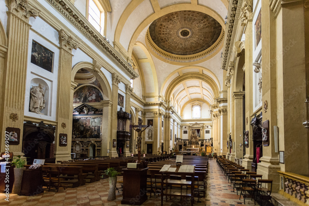 Interior of a historic church with a domed ceiling