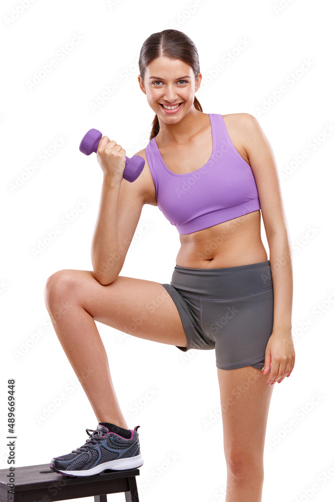 Exercise is my natural high. Shot of a beautiful woman training with weights. Exercise is my natural high. Shot of a beautiful woman training with weights.
