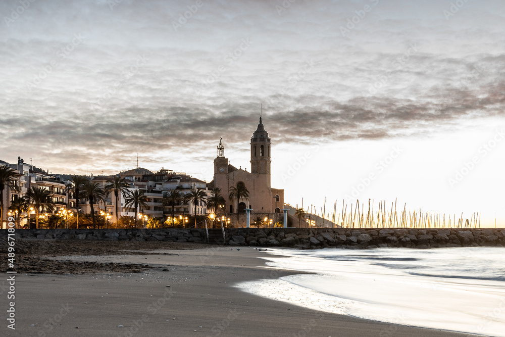 Obraz premium Old church and landmark in Sitges, Spain. Church of Sant Bartomeu & Santa Tecla.