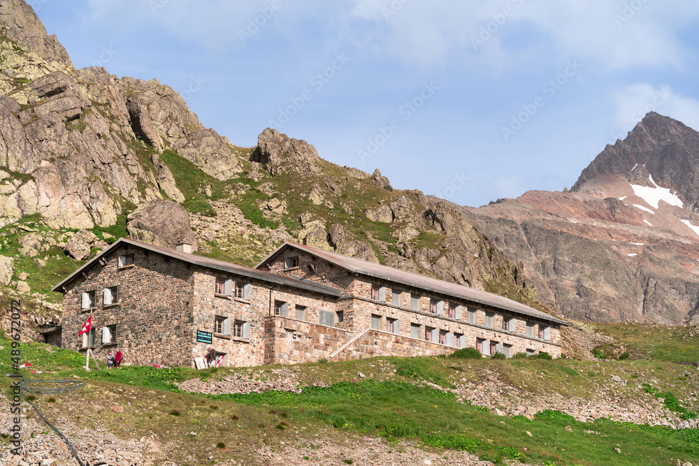 Sustenpass, Switzerland - August 13, 2021: The lodge at the Susten Pass (2224 m high) that connects the Canton of Uri with the Canton of Bern.