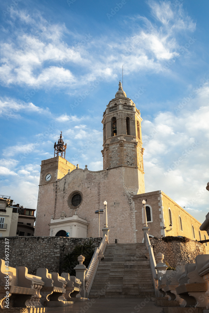 Old church and landmark in Sitges, Spain. Church of Sant Bartomeu & Santa Tecla.