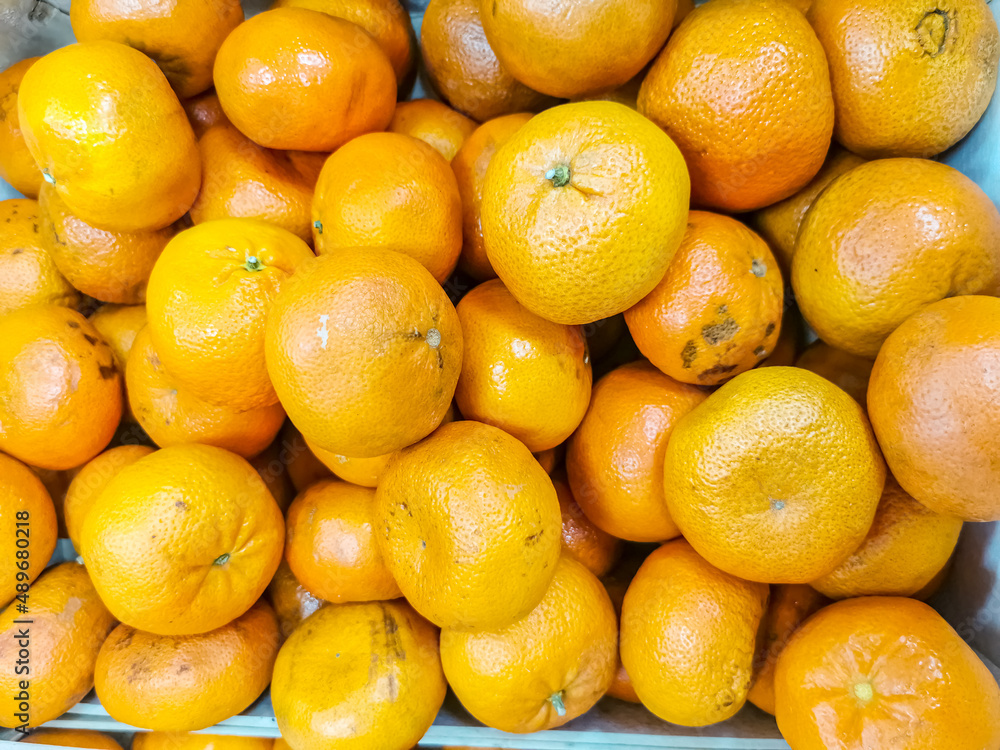 texture of oranges on market showcase. artistic blur, selective focus texture of oranges on market showcase. artistic blur, selective focus