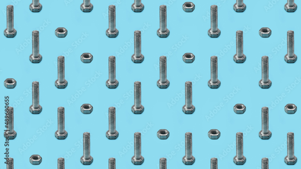 Metal bolt, nut on a blue background, fixing material. Pattern, background, studio shot. Metal bolt, nut on a blue background, fixing material. Pattern, background, studio shot.