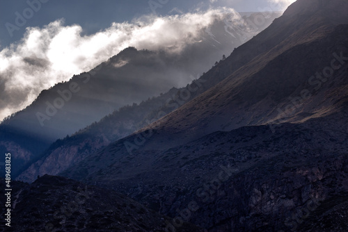 sun rays in mountains and sky