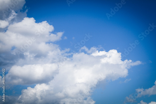 blue sky cloudscape fluffy atmosphere air high environment clouds white puffy cumulous heavenly cloud formation