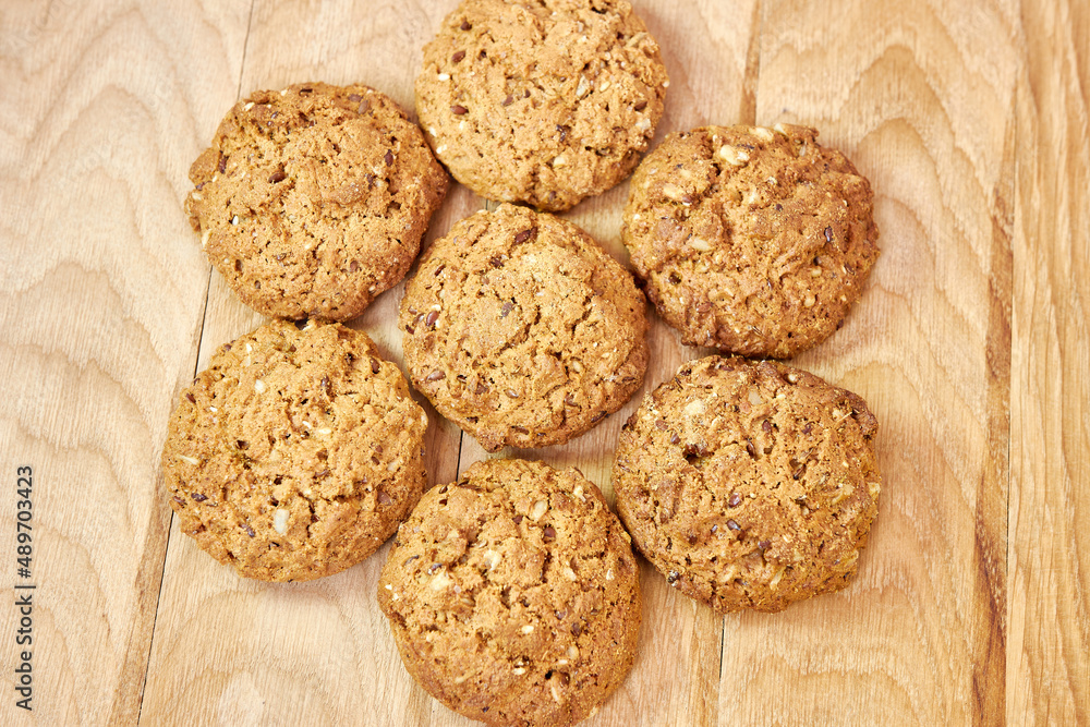 Delicious oatmeal cookies with sunflower seeds and peanuts. Healthy diet. Delicious oatmeal cookies with sunflower seeds and peanuts. Healthy diet.
