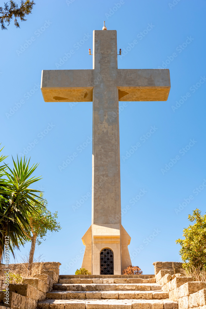 Cross on top of Filerimos mountain, Rhodes island, Greece Cross on top of Filerimos mountain, Rhodes island, Greece