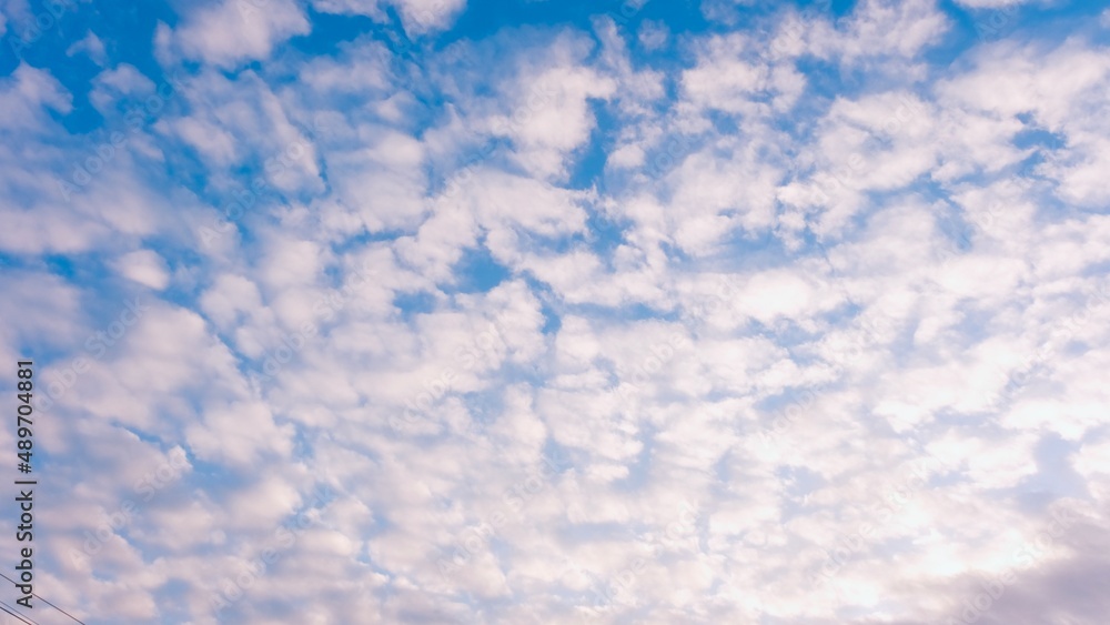 Fluffy cloud against blue sky, natural daylight and white clouds floating on blue sky. Fluffy cloud against blue sky, natural daylight and white clouds floating on blue sky.