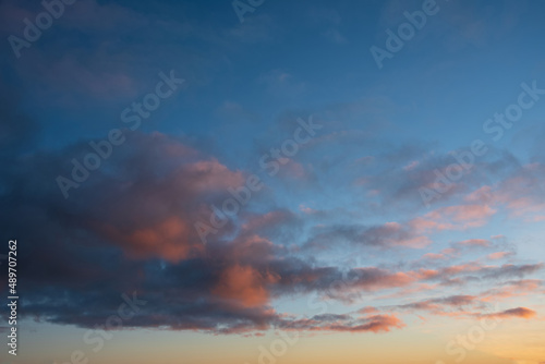 Beautiful multi colored sunset landscape image with vibrant tones for use as background or in composite images © veneratio
