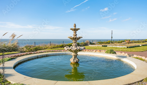  The garden pond and fountain in the Esplanade Gardens in the seaside town of Hunstanton on the North Norfolk coast