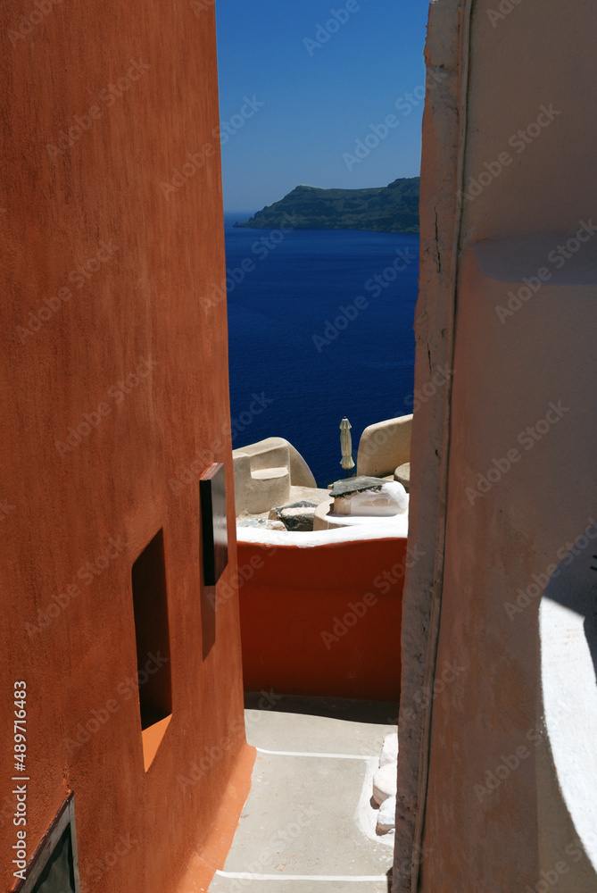Thira on the island of Santorini is a volcanic island in the Aegean Sea, which is part of the Cyclades archipelago.Multi-coloured abstrakt architecture on island.