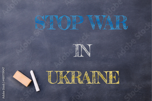 Stop war in Ukraine chalk on a blackboard.