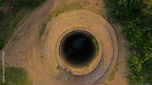 Aerial view from top to inside of a deep water well  photo